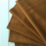 caramel raw silk noil folded multiple times
