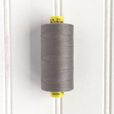 spool of gutermann mara 70 sewing thread in silver