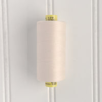 spool of gutermann mara 120 sewing thread in marshmallow