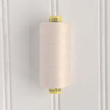 spool of gutermann mara 120 sewing thread in marshmallow