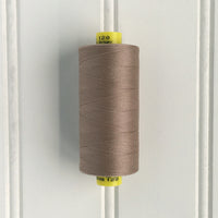 spool of gutermann mara 120 sewing thread in frosted almond