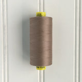 spool of gutermann mara 120 sewing thread in frosted almond