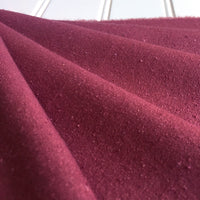 mauve raspberry raw silk noil folded multiple times